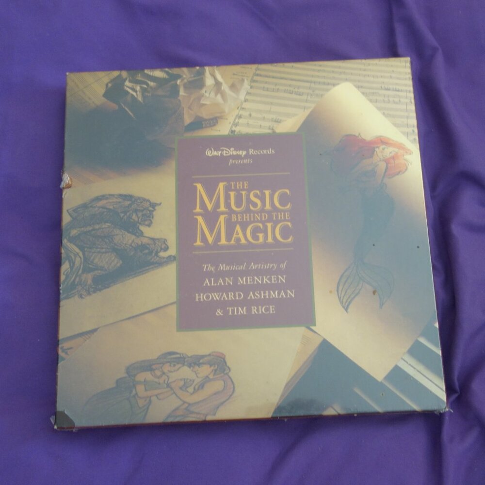 Walt Disney Records presents THE MUSIC BEHIND THE MAGIC ISBN 1-55723-619-4